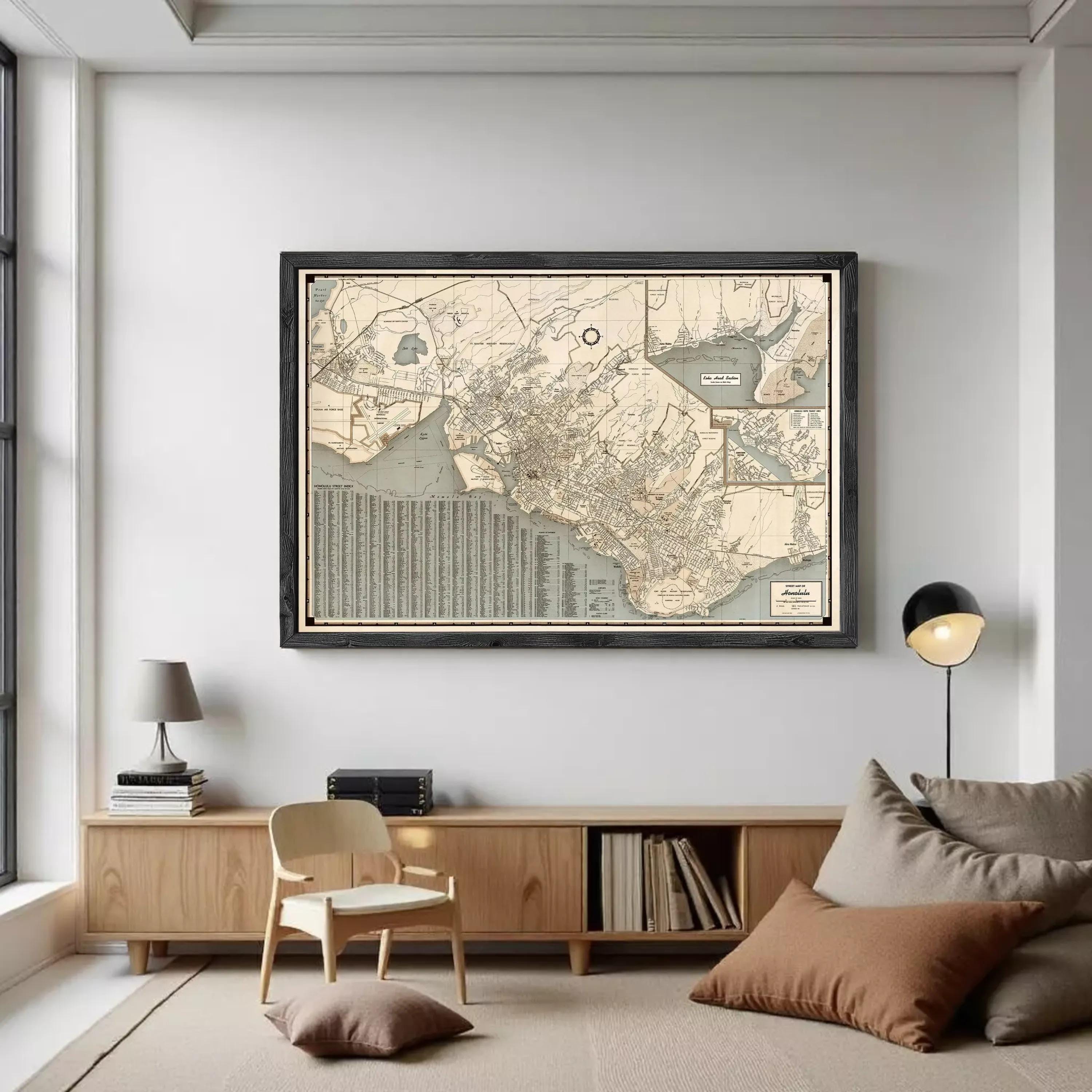 The image is a framed vintage map of a city, depicting various streets, landmarks, and bodies of water.