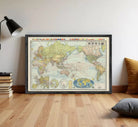 The image is a framed vintage map of the world, depicting various countries and regions with their respective flags.