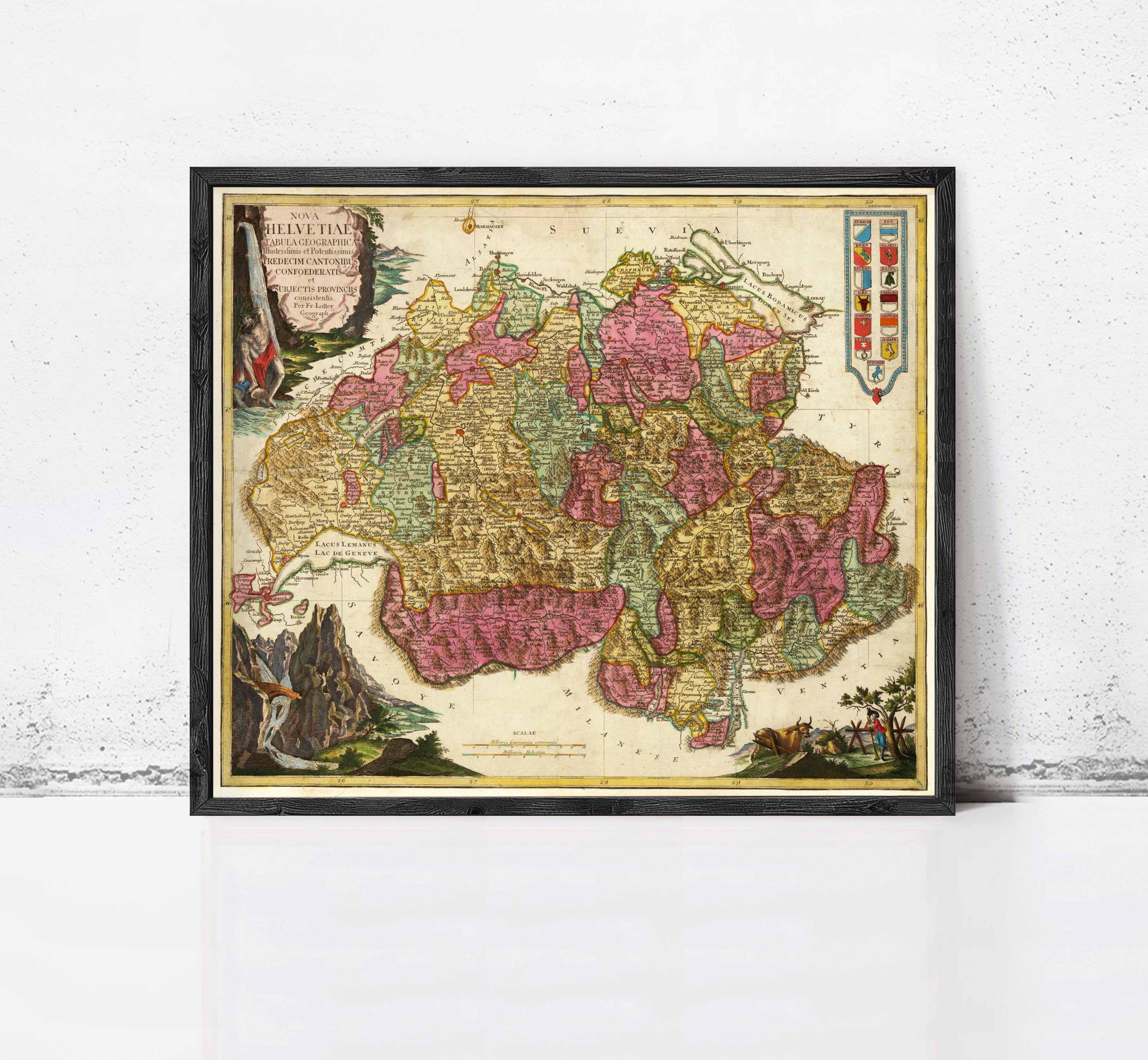 The image is a framed antique map of Europe, featuring detailed illustrations and colorful landmasses.