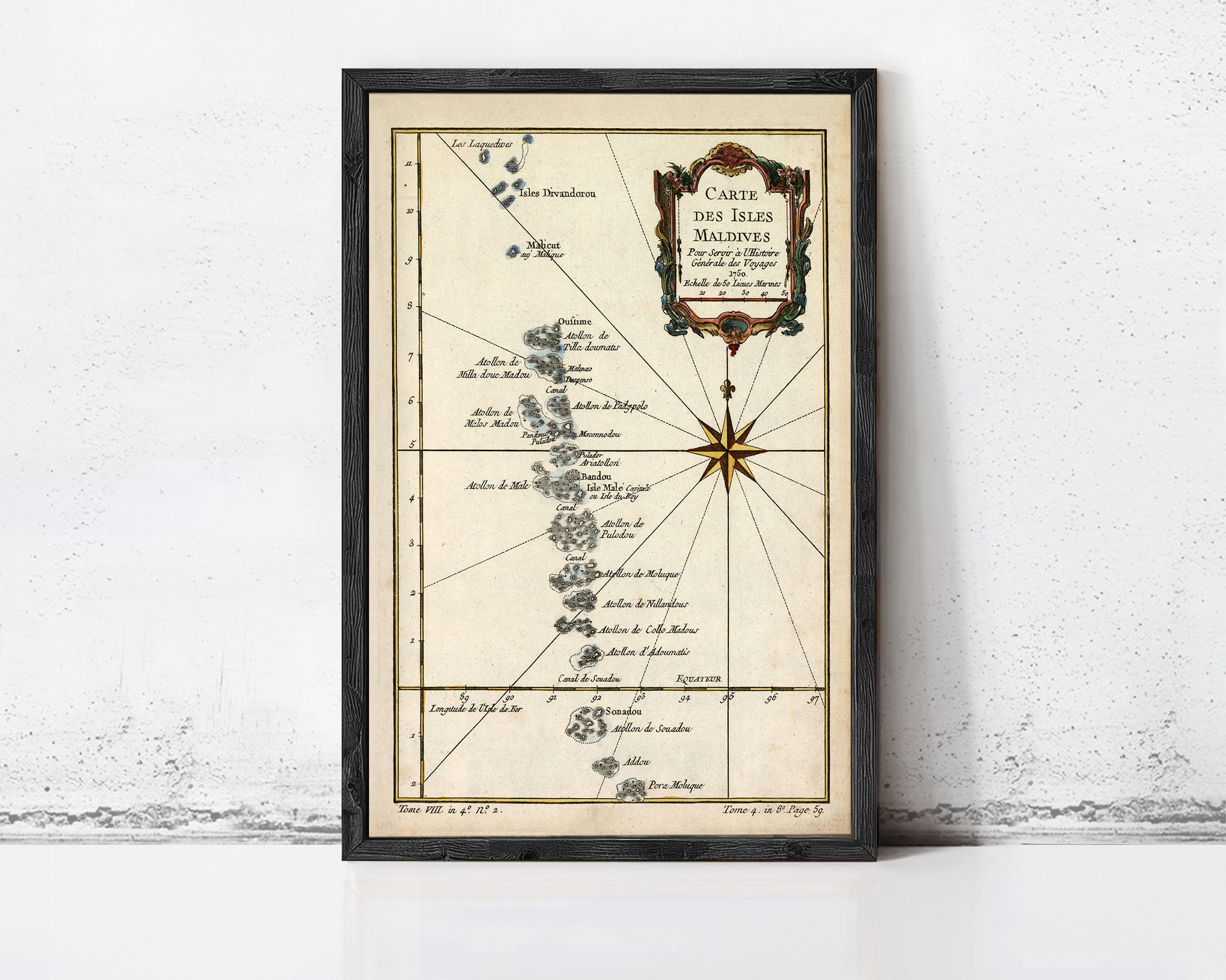 The image is a framed map of the Maldives, a group of islands located in the Indian Ocean.