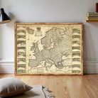 The image is a framed antique map of Europe, depicting various regions and countries across the continent.