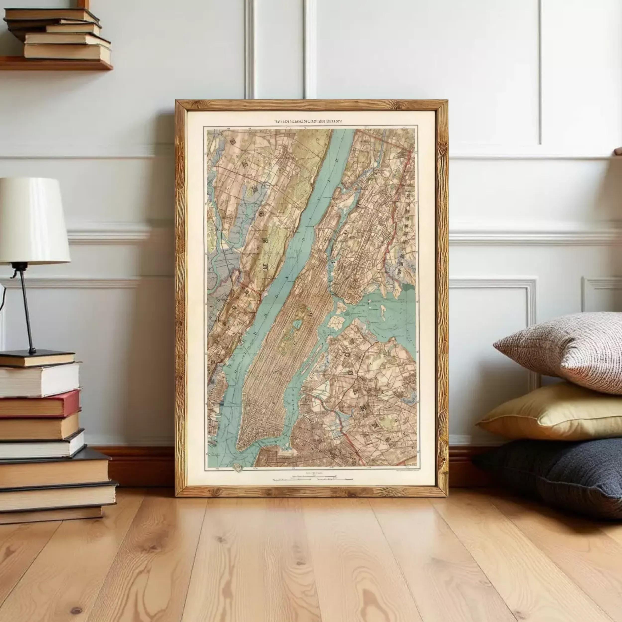 The image is a framed vintage map of New York City, depicting the city's streets, waterways, and surrounding areas.