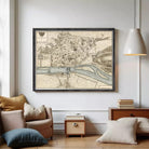 The image is a framed map of the city of Rouen, France, depicting the city's layout and surrounding areas.