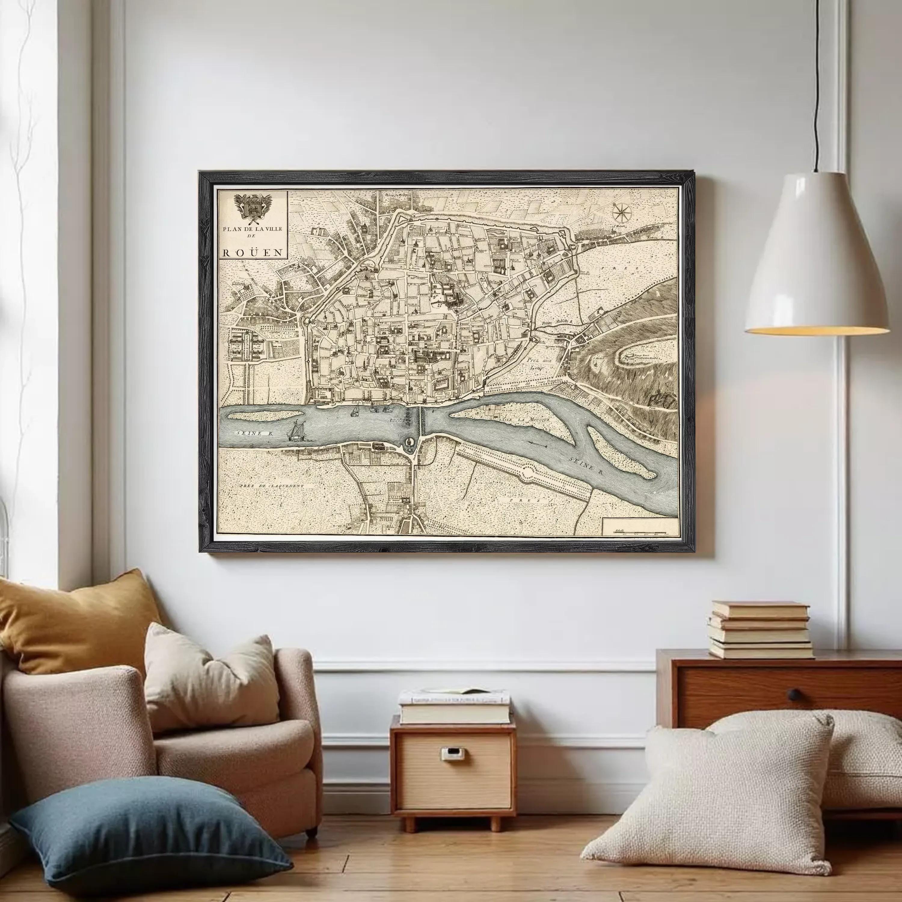 The image is a framed map of the city of Rouen, France, depicting the city's layout and surrounding areas.