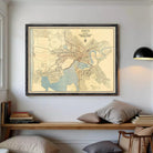 The image is a framed vintage map of the city of Perth, Australia, depicting the city's streets, waterways, and surrounding areas.