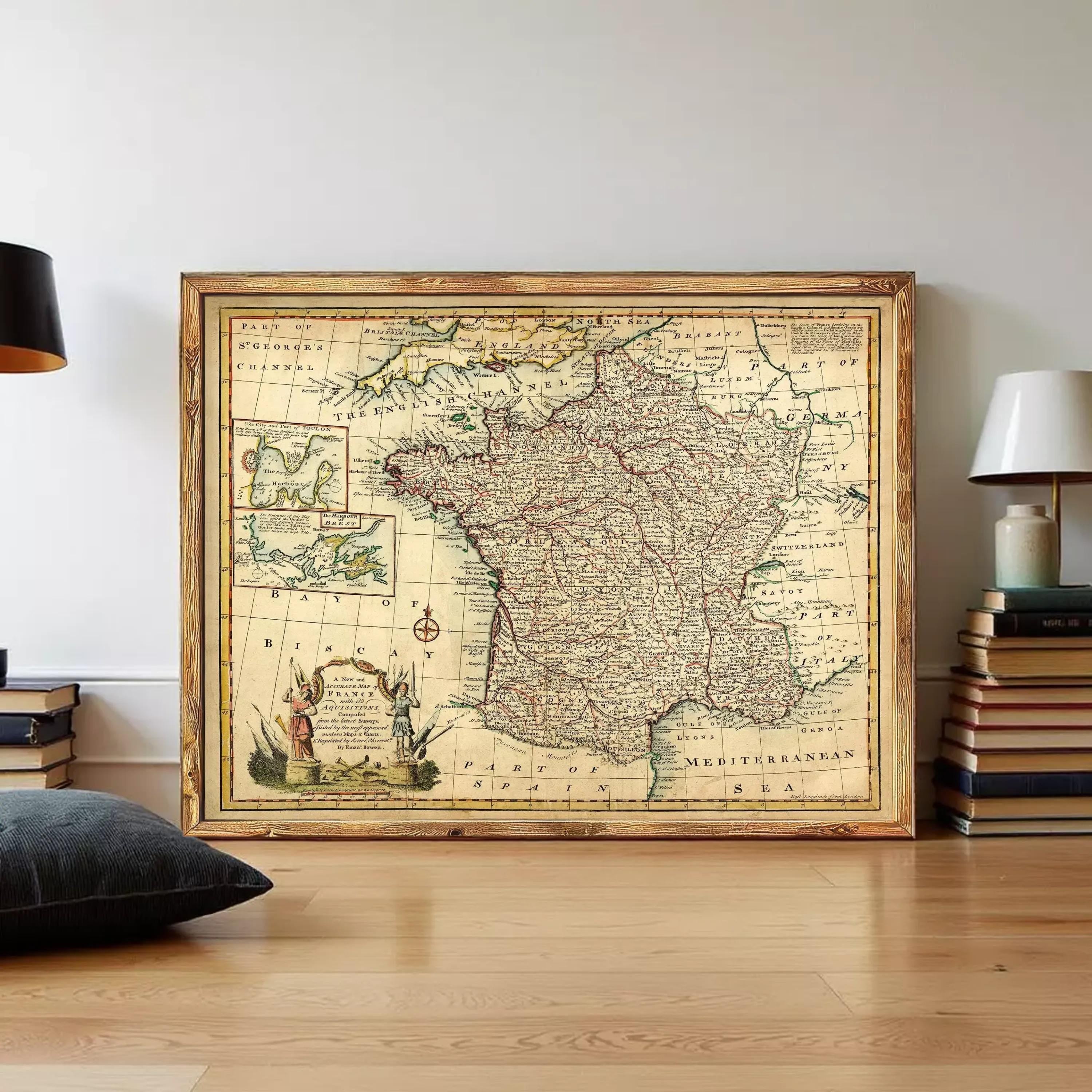The image is a framed vintage map of France, depicting the country's geographical layout and surrounding regions.