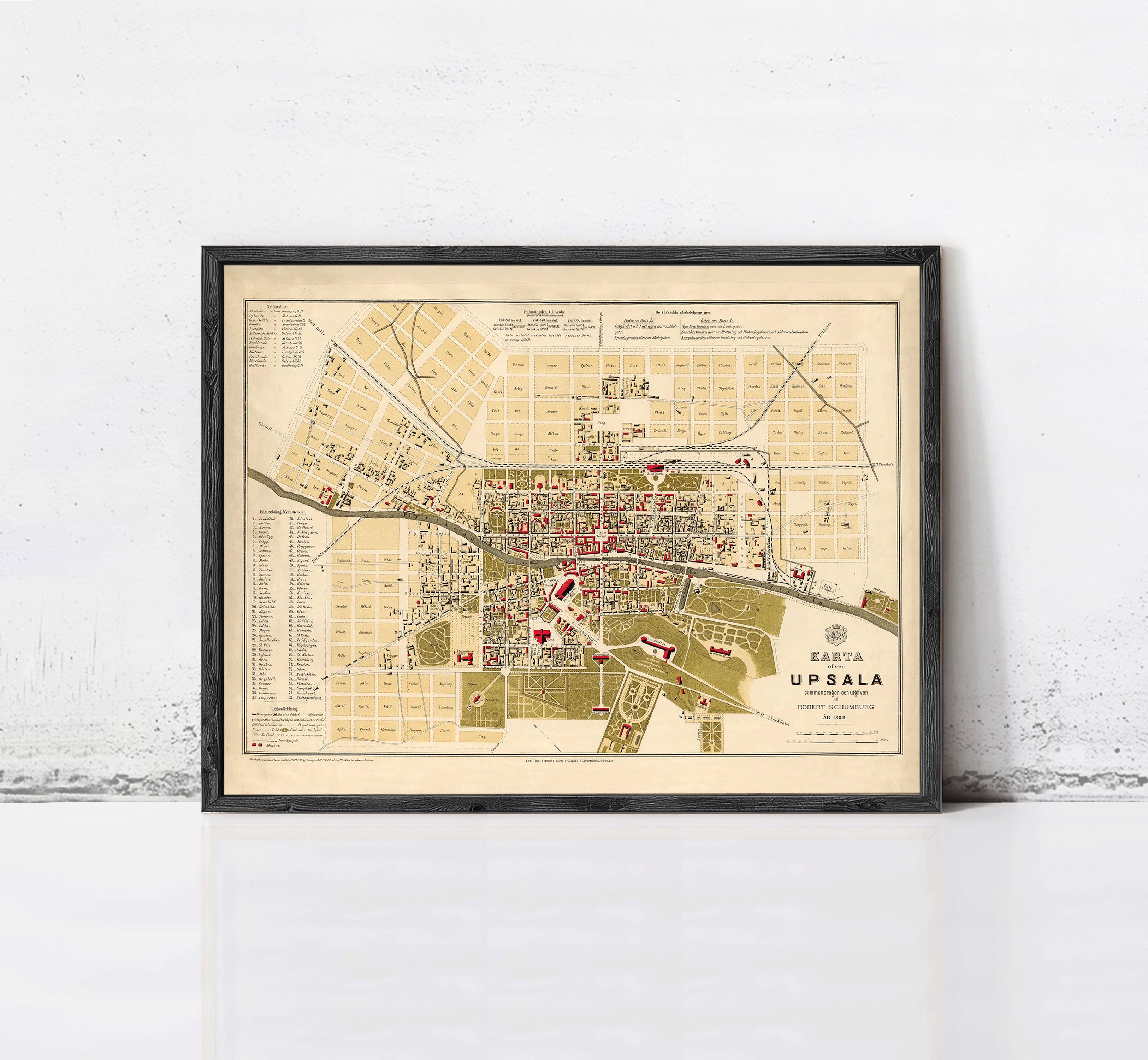 The image is a framed vintage map of Uppsala, Sweden, depicting the city's layout and surrounding areas.