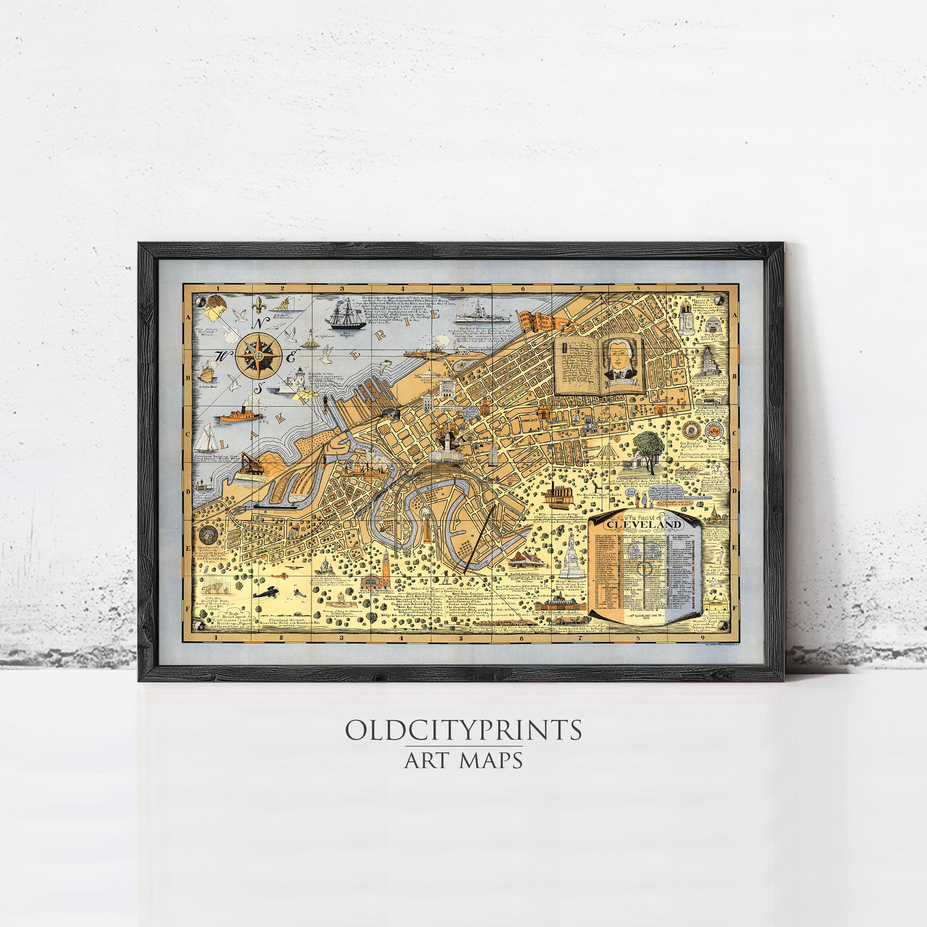 The image is a framed art map of Cleveland, Ohio, depicting various landmarks and locations within the city.