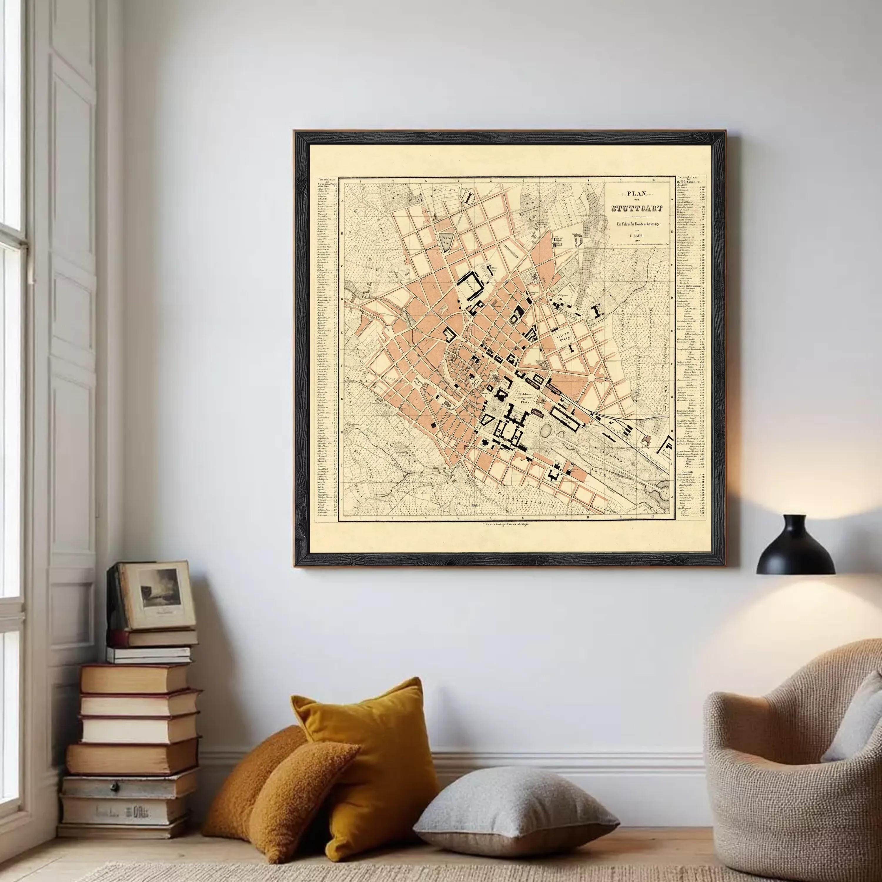 The image is a framed map of a city, likely from the 19th century, depicting a detailed layout of the streets and surrounding areas.