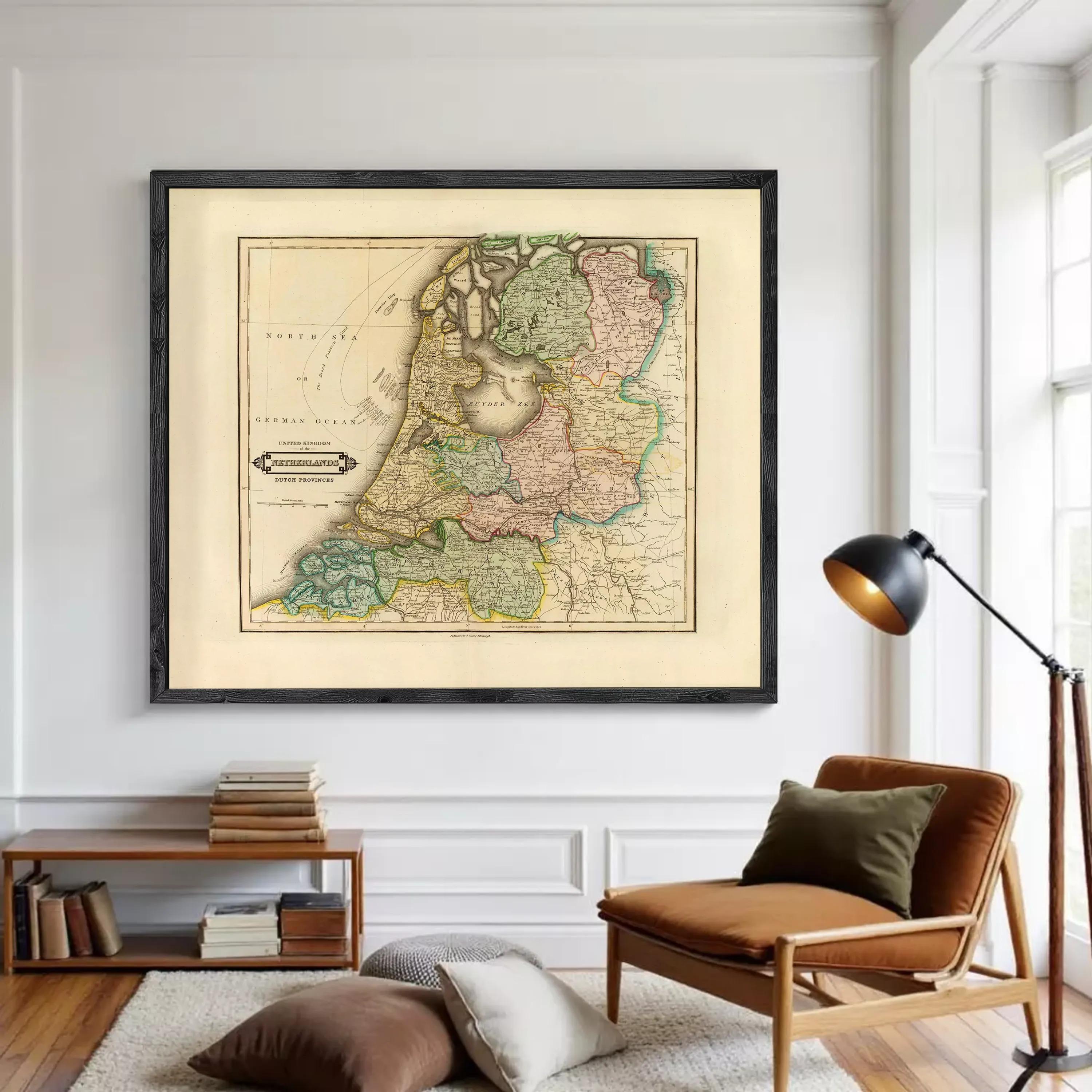The image is a framed map of the Netherlands, depicting the country's geographical layout and boundaries.