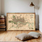 The image is a framed map of London, England, depicting the city's streets and landmarks.