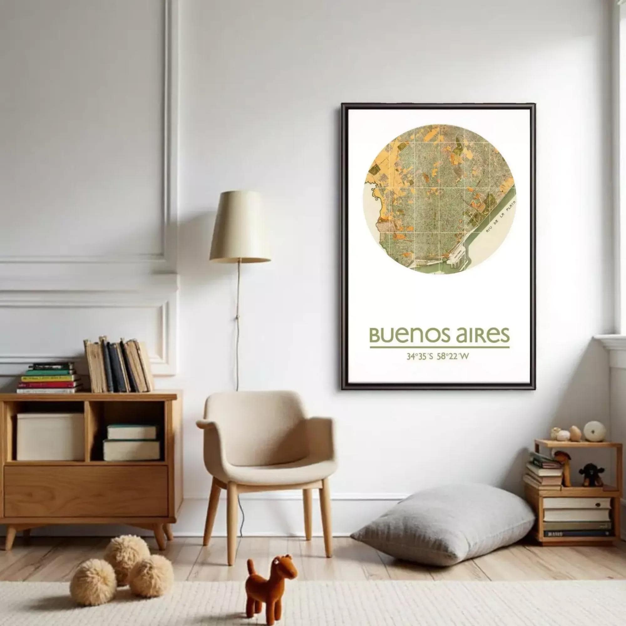 a cozy living room with a large framed map of Buenos Aires hanging on the wall, a lamp, a chair, a bookshelf, and a stuffed animal on the floor.