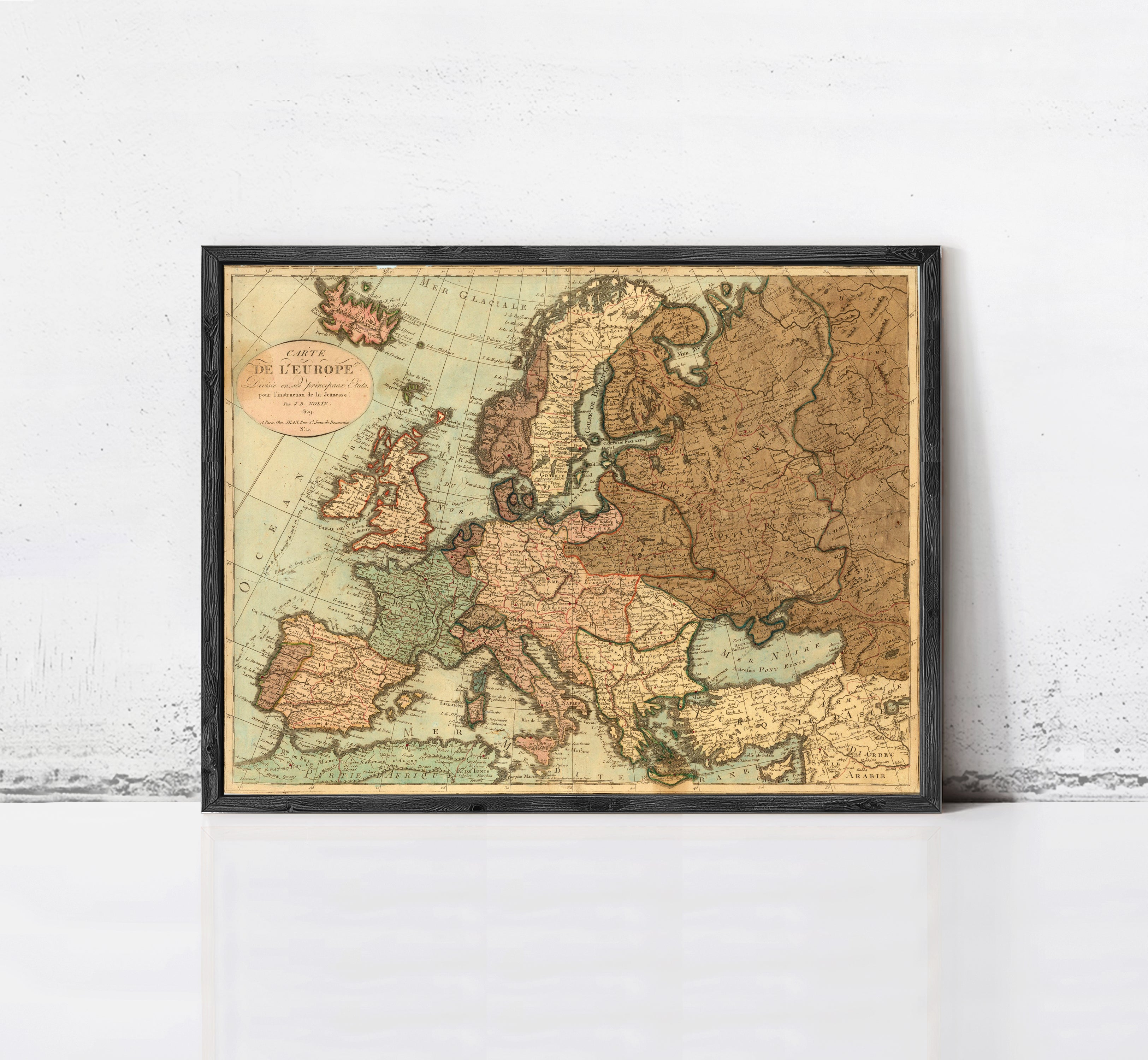 The image is a framed vintage map of Europe, depicting the continent and surrounding seas.