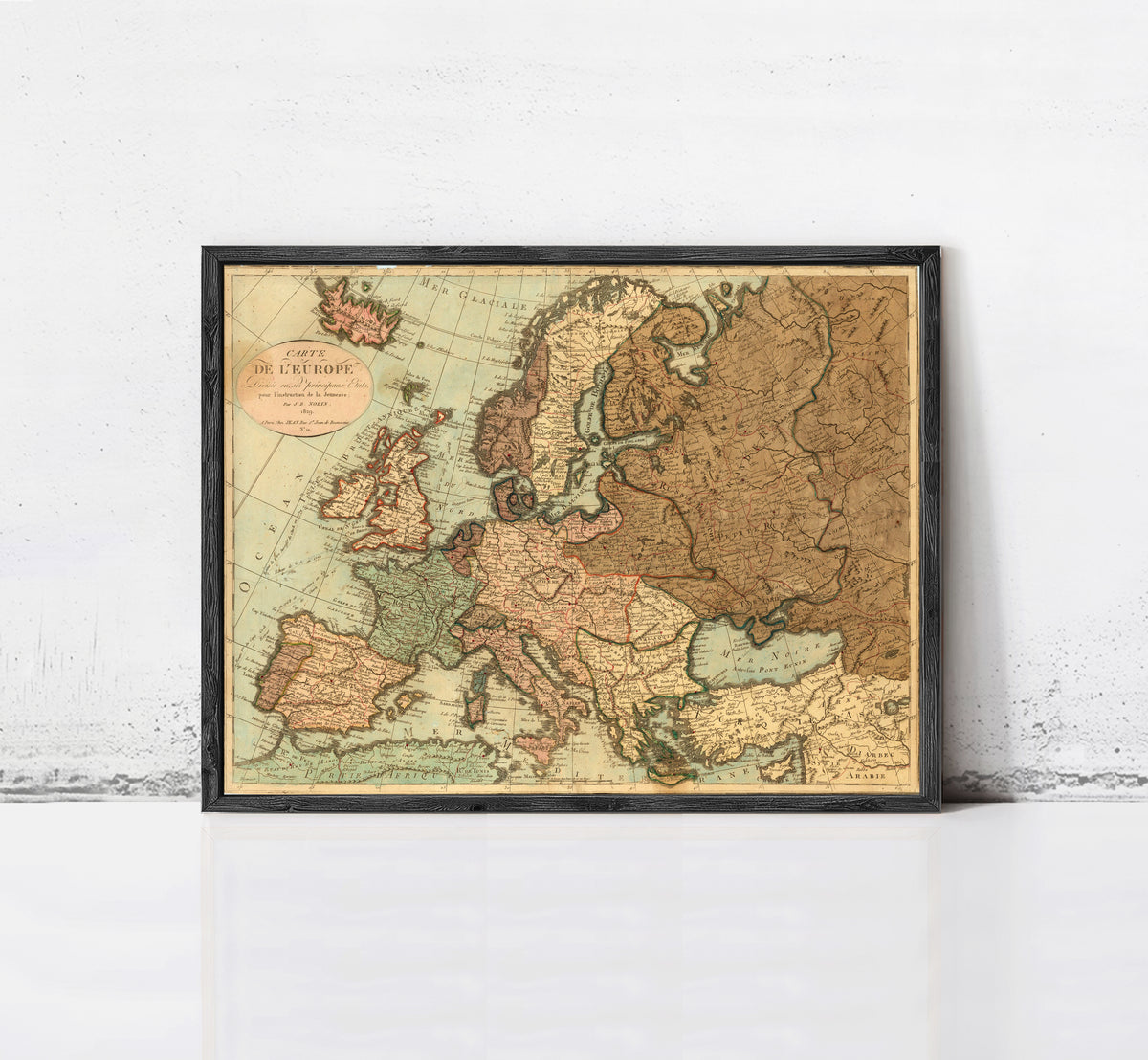The image is a framed vintage map of Europe, depicting the continent and surrounding seas.