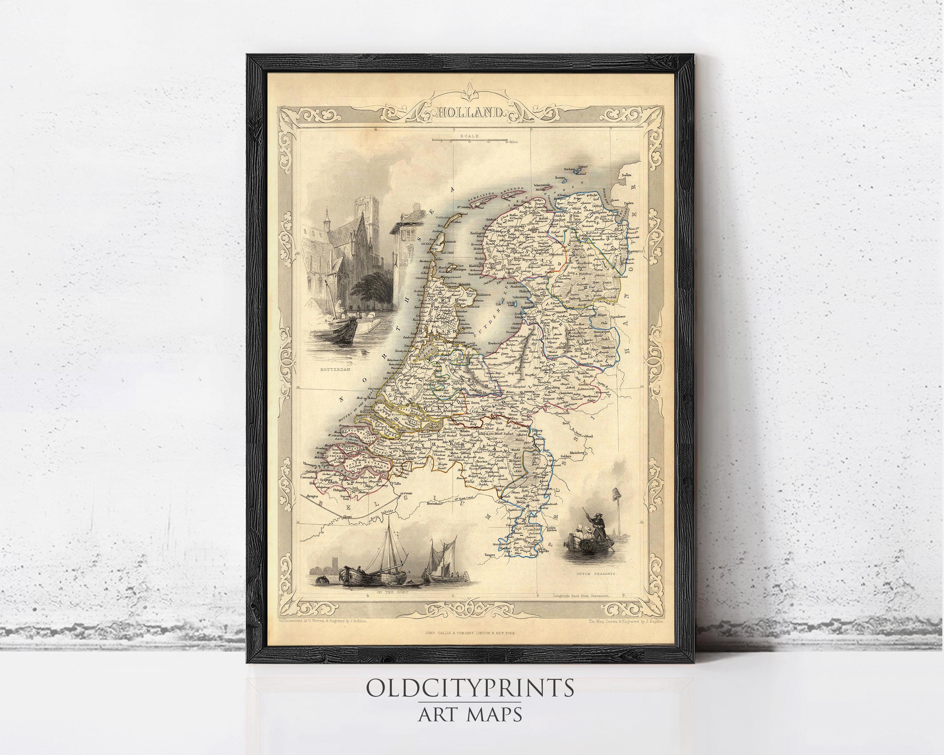 The image is a framed antique map of the Netherlands, featuring detailed illustrations of ships, buildings, and landscapes.