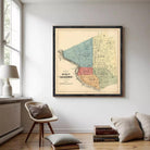 The image is a framed vintage map of Reading, Massachusetts, depicting the city's layout and boundaries.