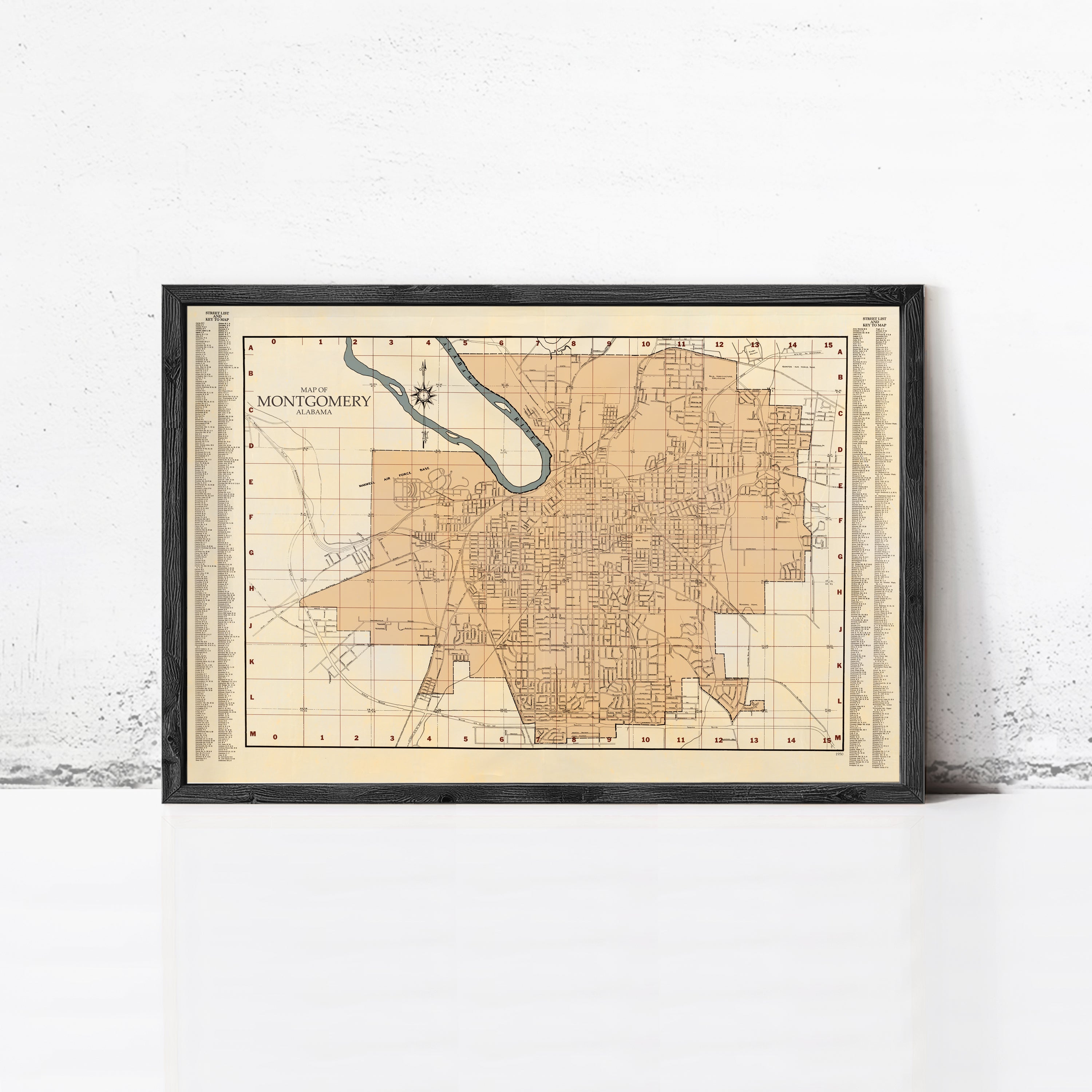 The image is a framed map of the city of Montgomery, Alabama, with a black border and a beige background.