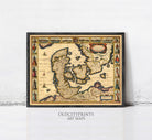 The image is a framed antique map of Europe, featuring detailed illustrations and labels.