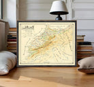 The image is a framed vintage map of a region, likely depicting a mountainous area, with various roads and landmarks marked on it.