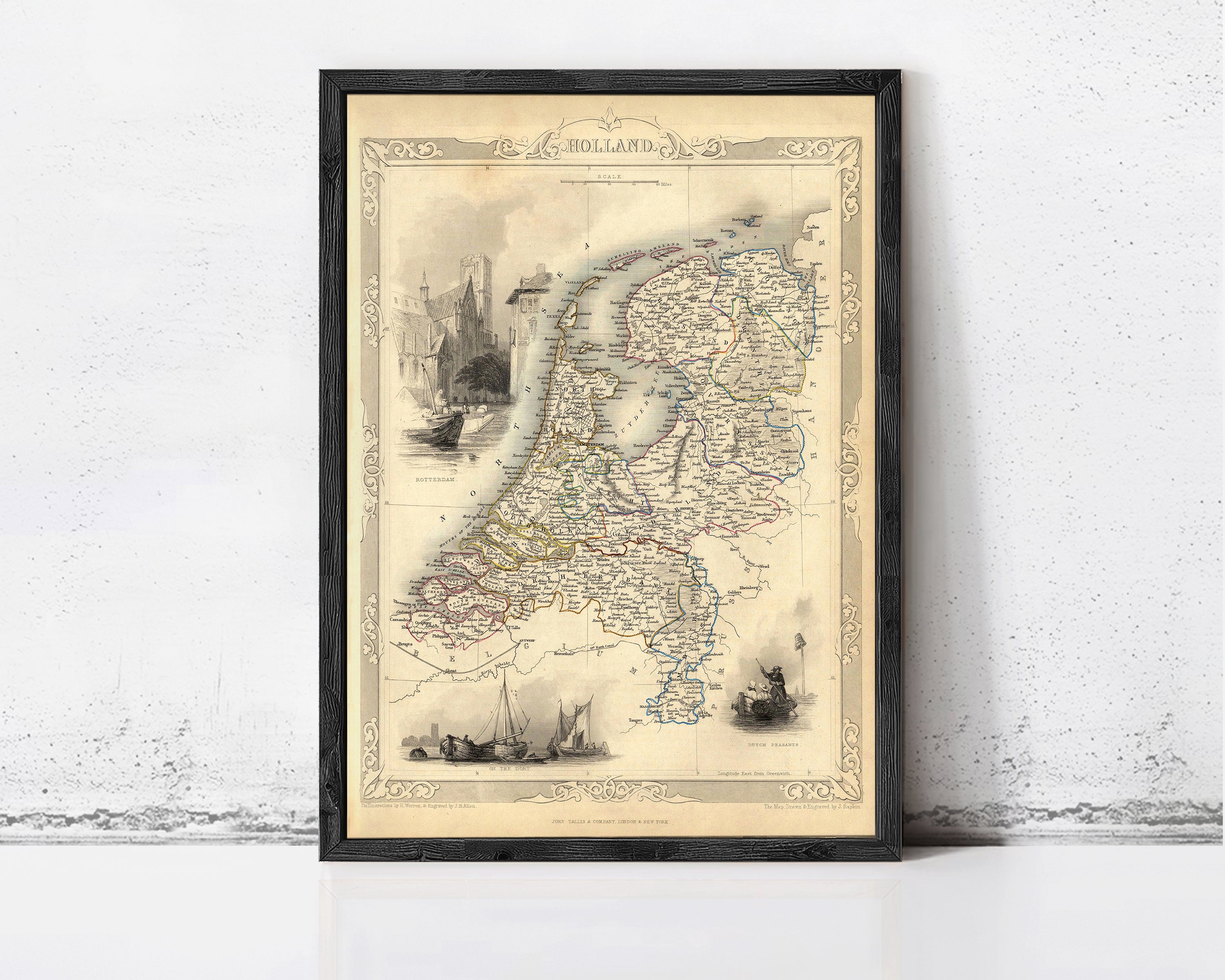 The image is a framed map of the Netherlands, depicting various landmarks and geographical features.