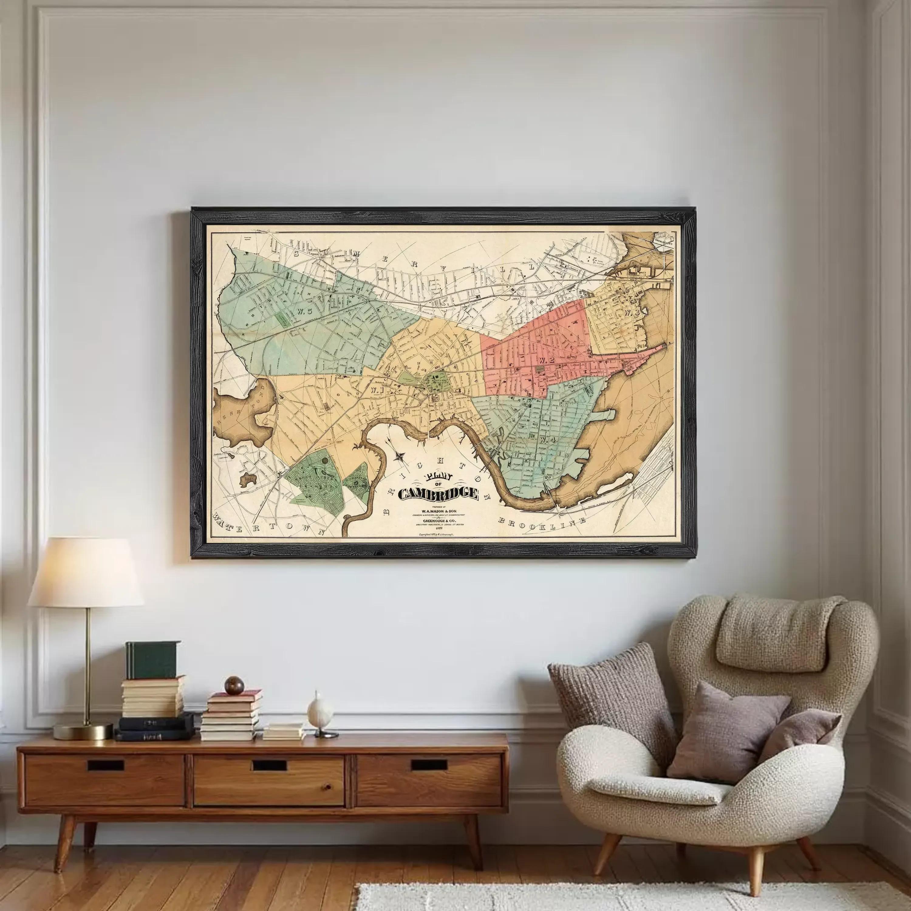 The image is a framed vintage map of Cambridge, Massachusetts, showing the city's streets and surrounding areas.
