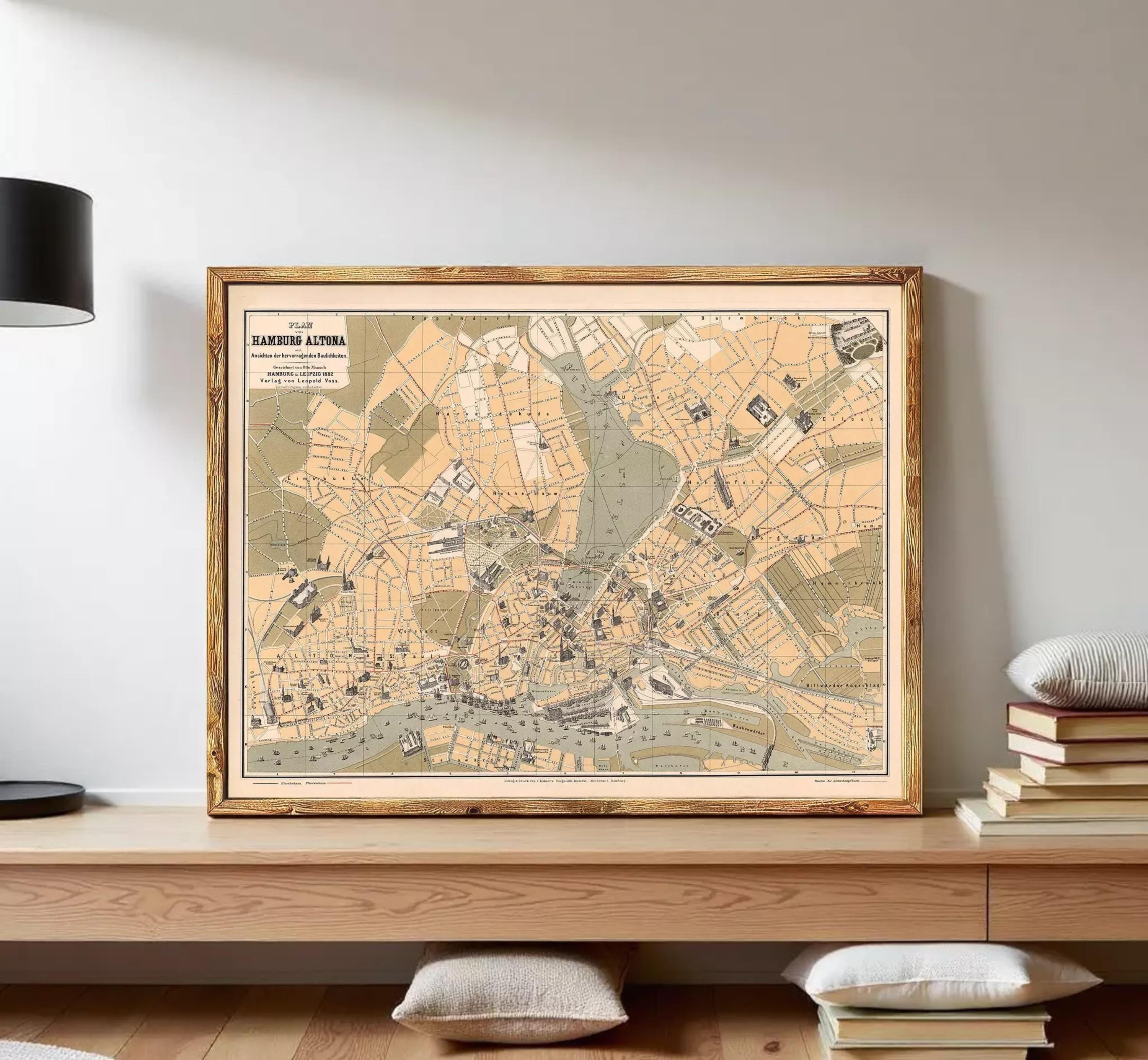 The image is a framed map of a city, likely London, with various streets, landmarks, and other geographical features depicted.