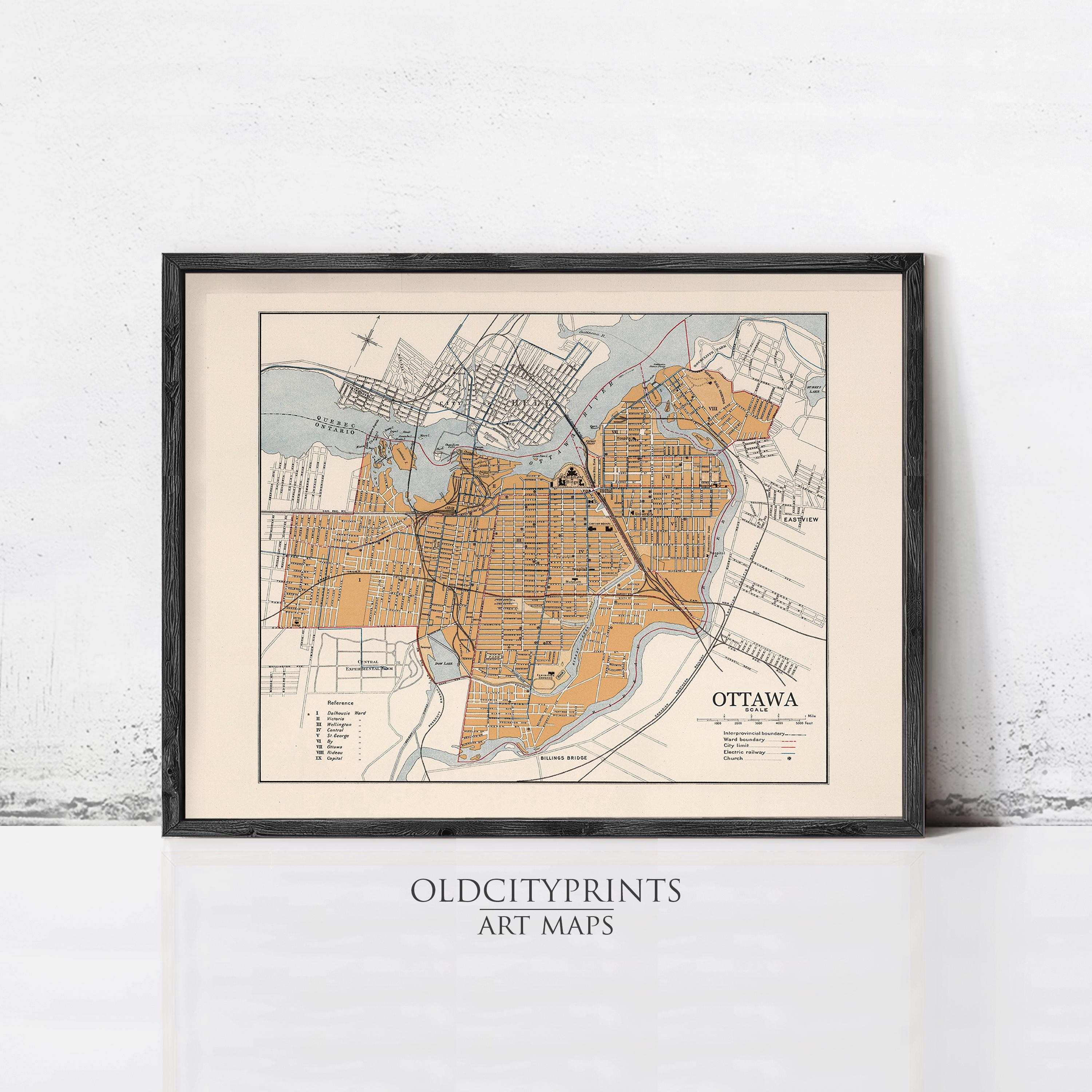 The image is a framed print of an old map of Ottawa, Canada, depicting the city's streets and surrounding areas.
