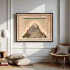 The image is a framed illustration depicting a mountain range with various peaks and valleys.