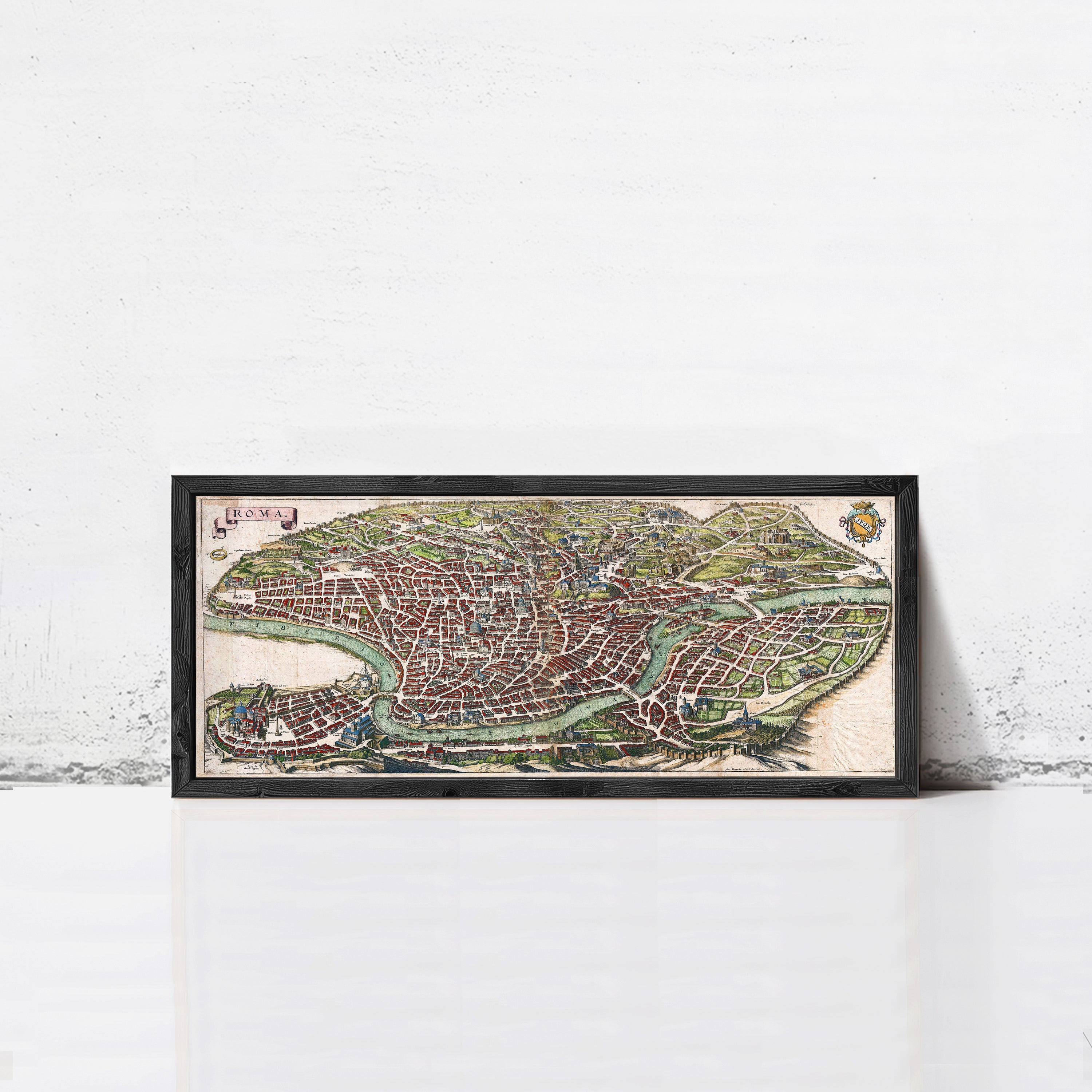 The image is a framed map of a city, likely Rome, with a detailed and colorful depiction of the urban layout and surrounding areas.