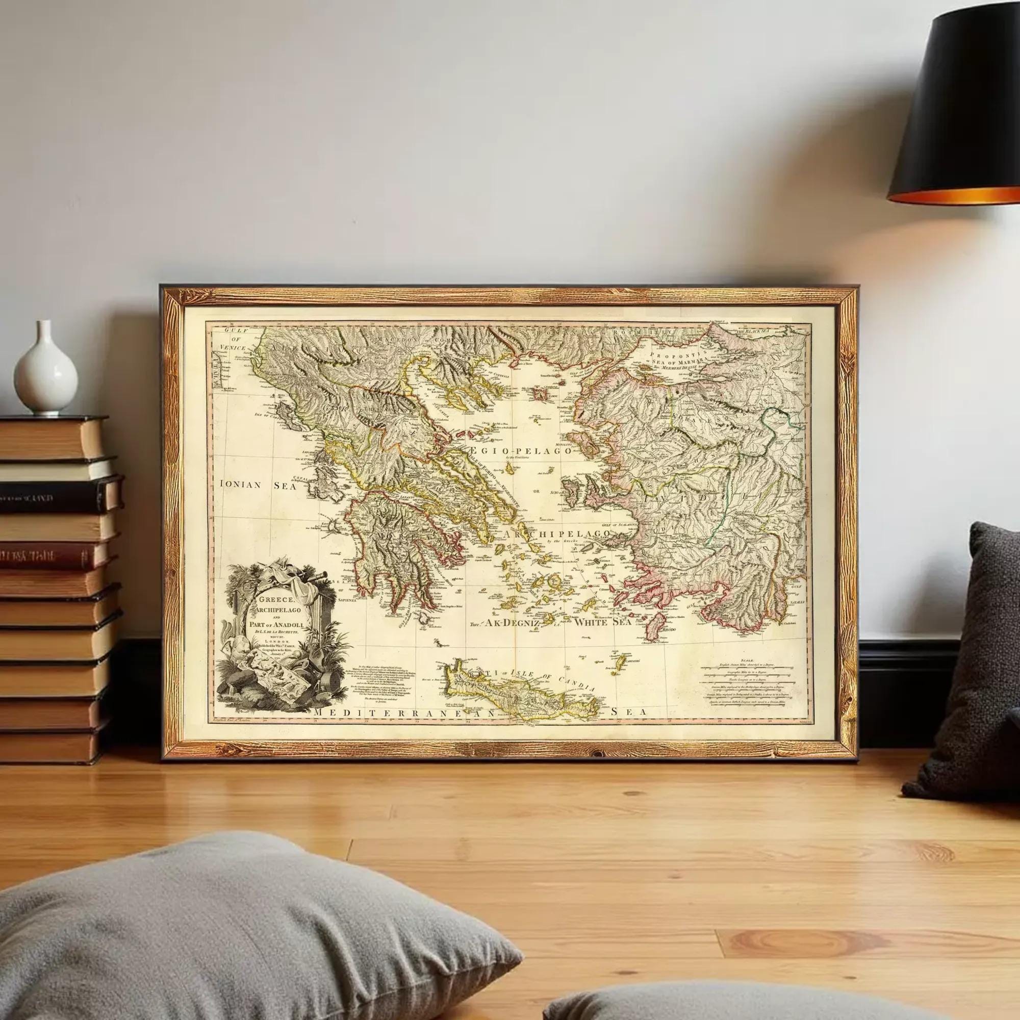 The image is a framed antique map of the Mediterranean region, depicting the Ionian Sea and the Greek islands.