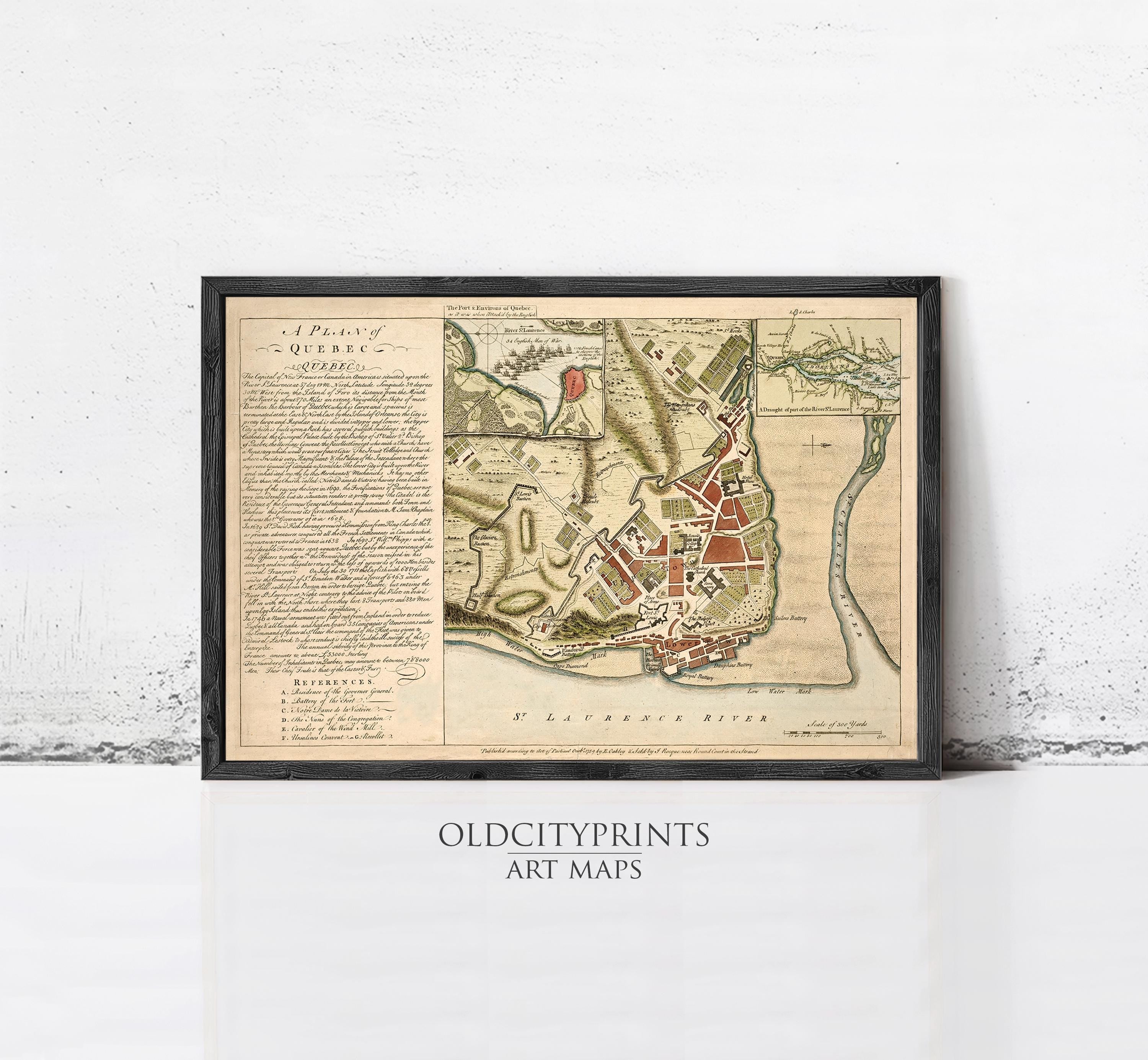 The image is a framed antique map of a city, likely from the 17th century, with detailed illustrations and labels.
