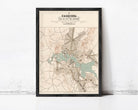 The image is a framed map of the city of canberra, Australia, depicting the city's layout and surrounding areas.