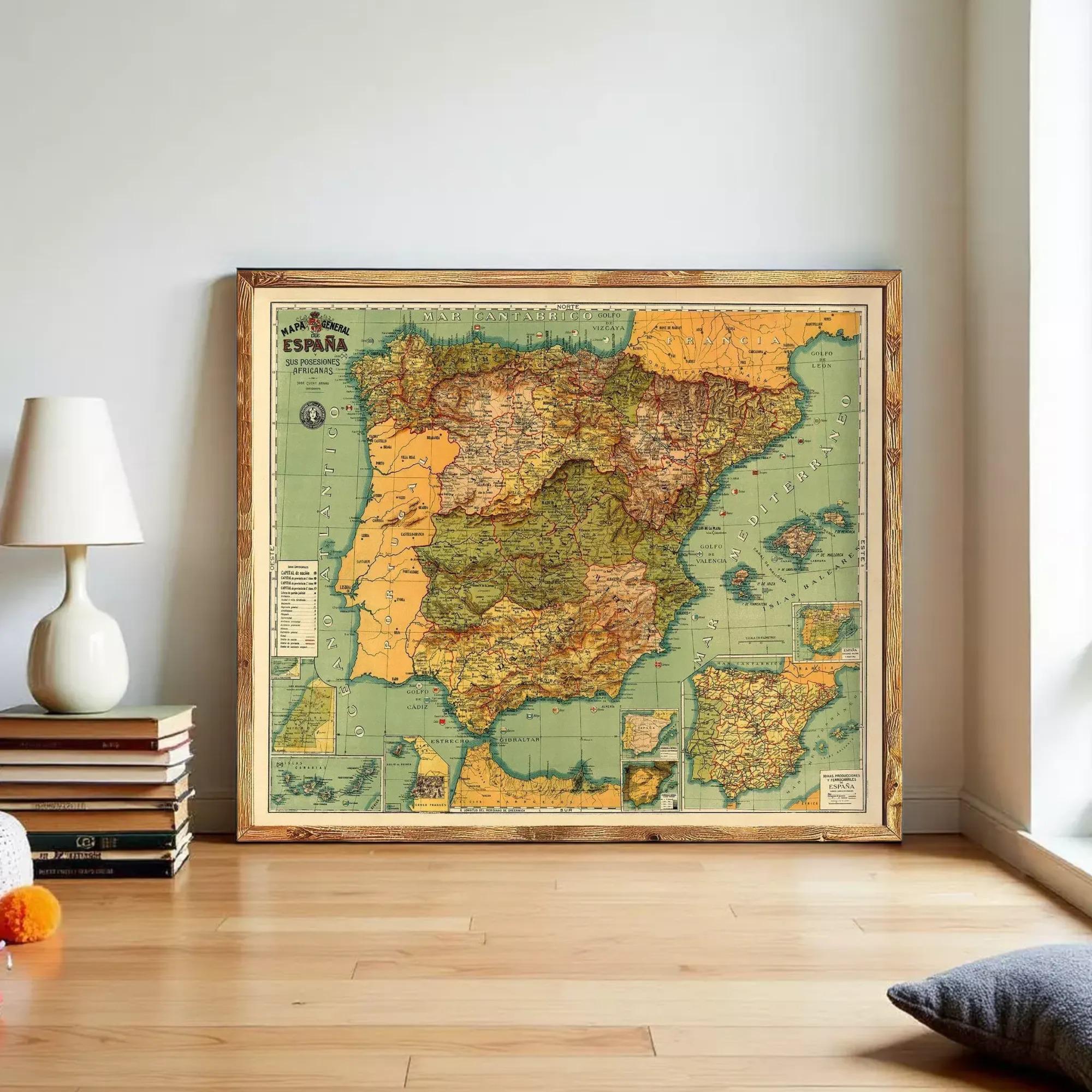 a large framed map of Spain and Portugal, with a vintage style and a wooden frame. The map is displayed on a wall in a room with a lamp and some books nearby.