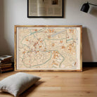The image is a framed map of Brussels, Belgium, showing the city's streets, landmarks, and surrounding areas.