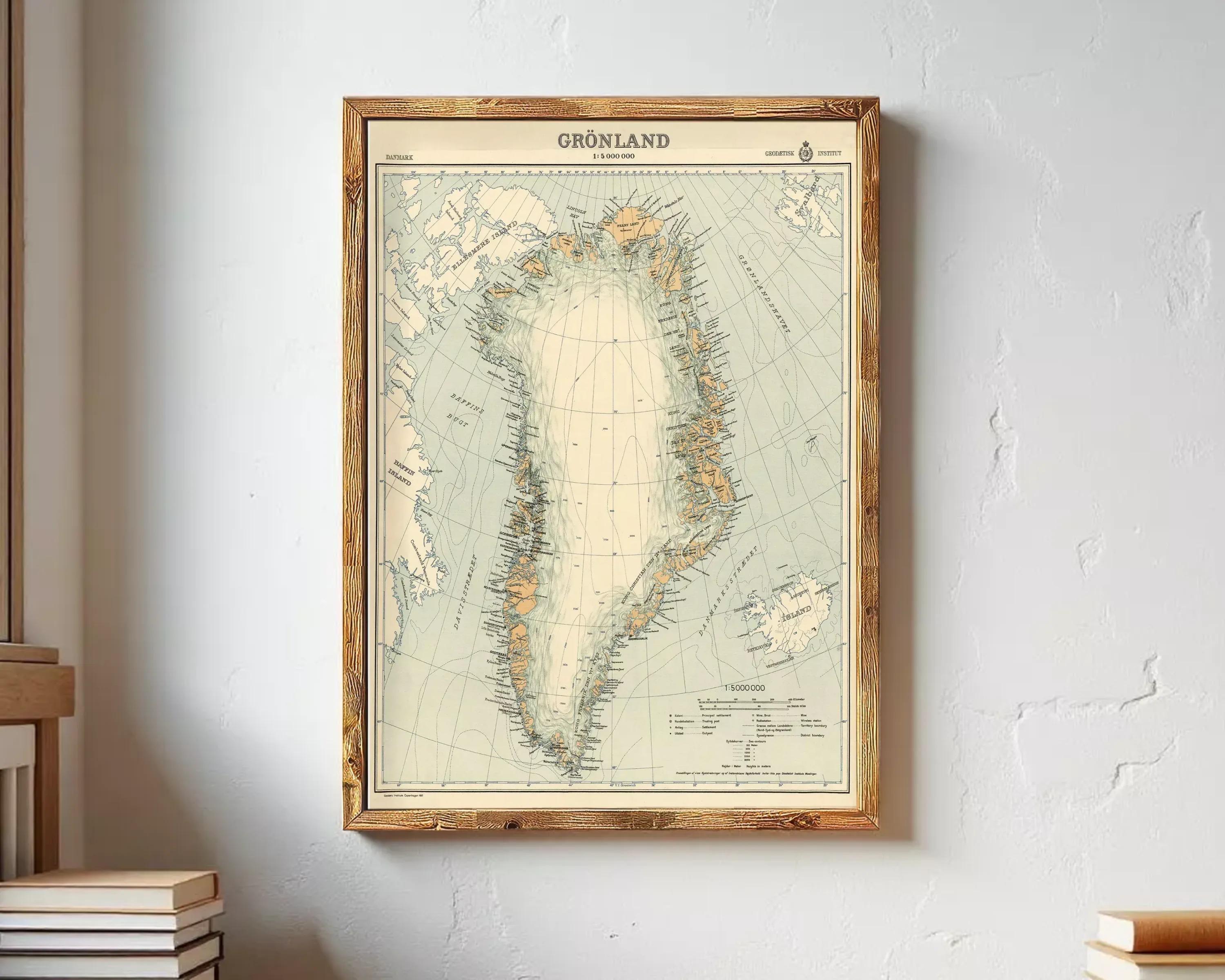 The image is a framed map of Greenland, depicting the country and surrounding areas in a vintage style.