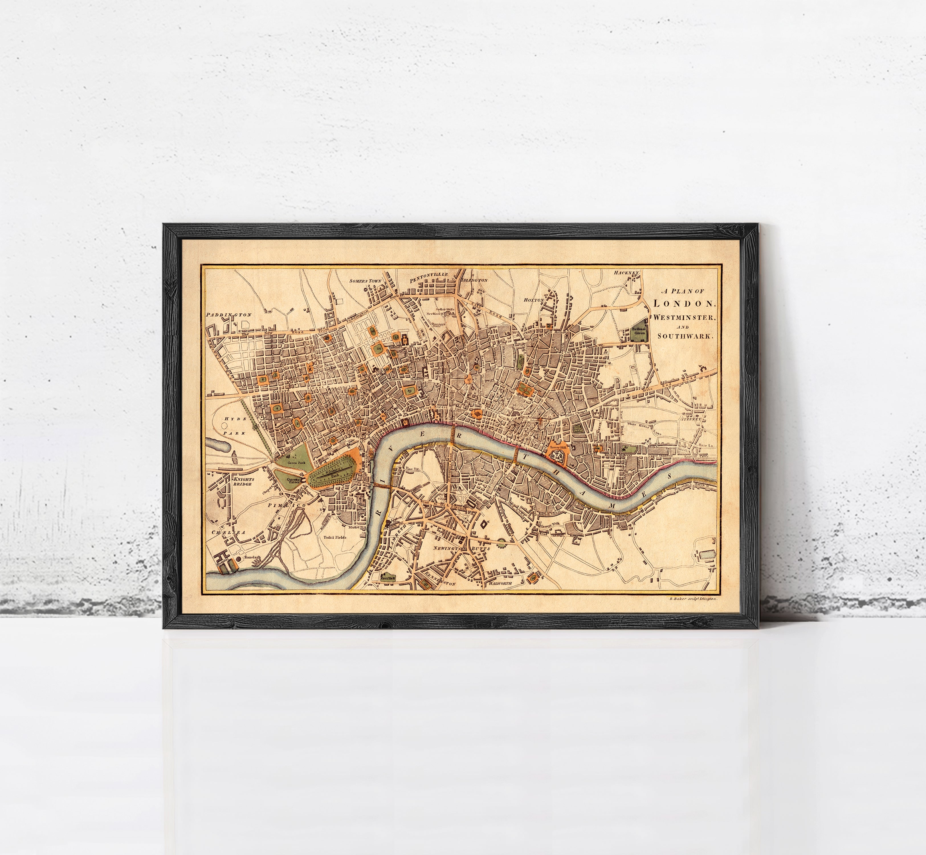 A framed map of London, England, dating back to the year 1753.