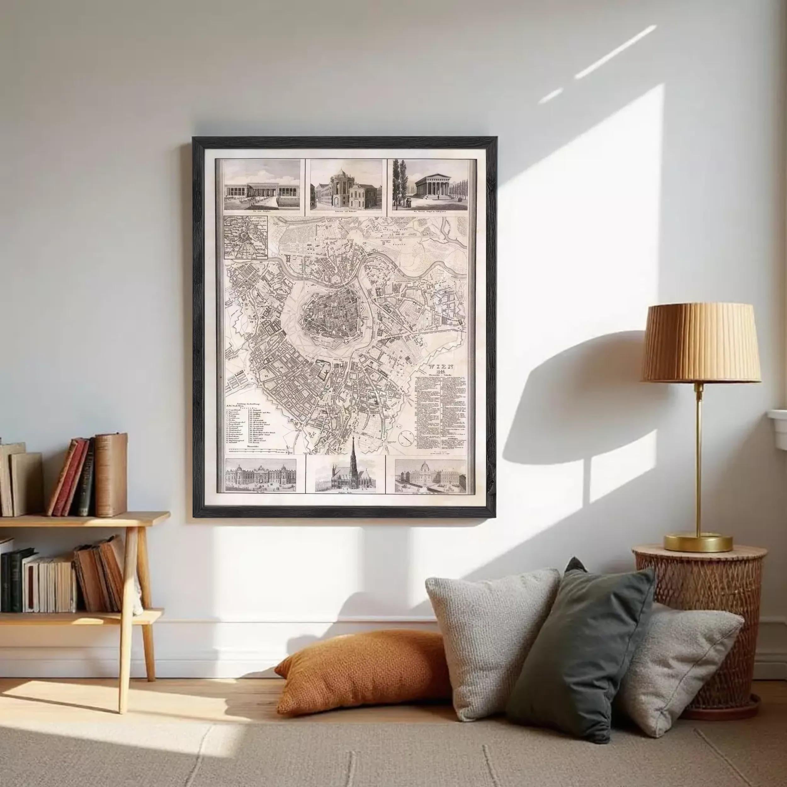 The image is a framed historical map of a city, depicting various landmarks and buildings.