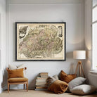 The image is a framed antique map of Europe, depicting various countries and regions in a detailed and intricate manner.