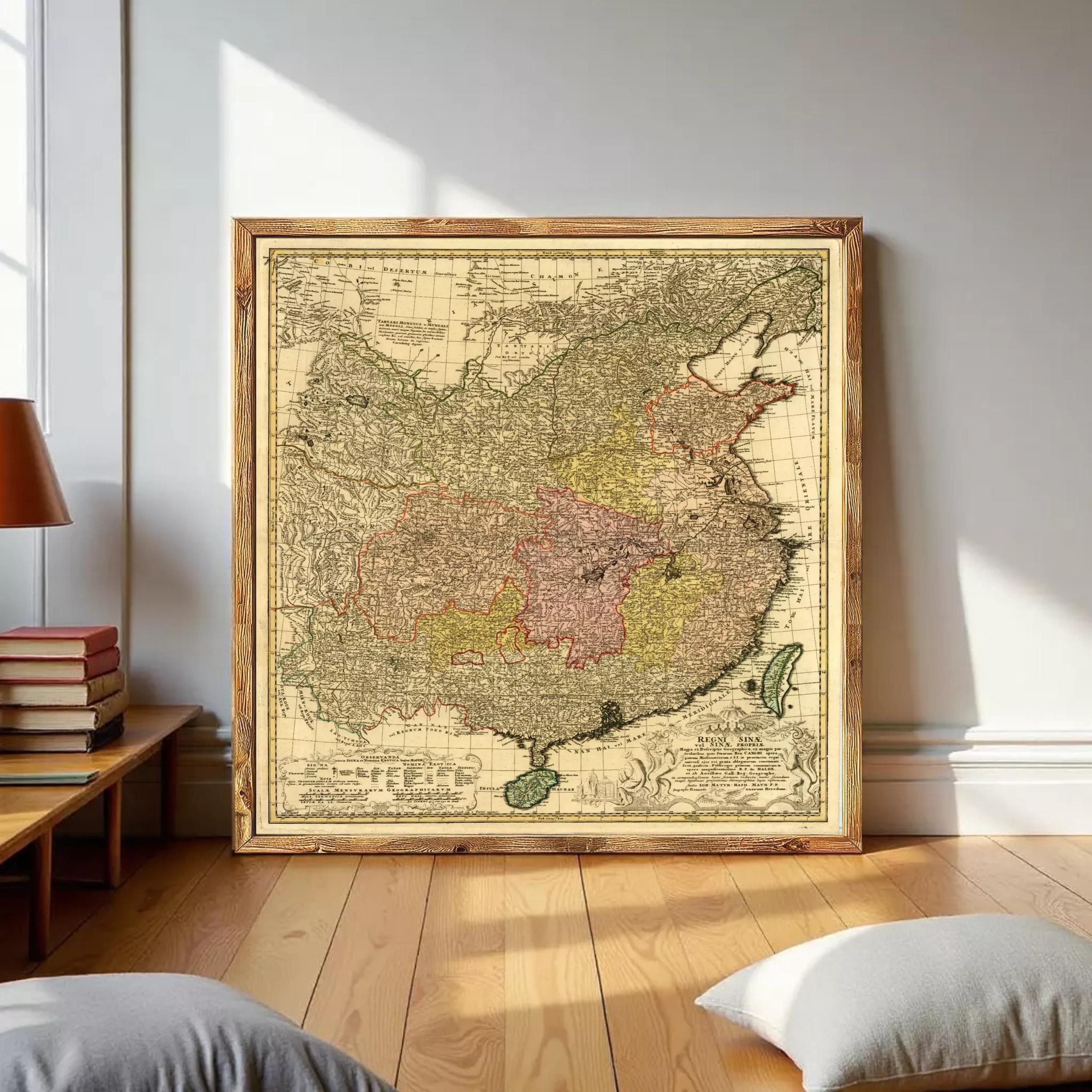 The image is a framed vintage map of China, featuring detailed cartography and geographical information.