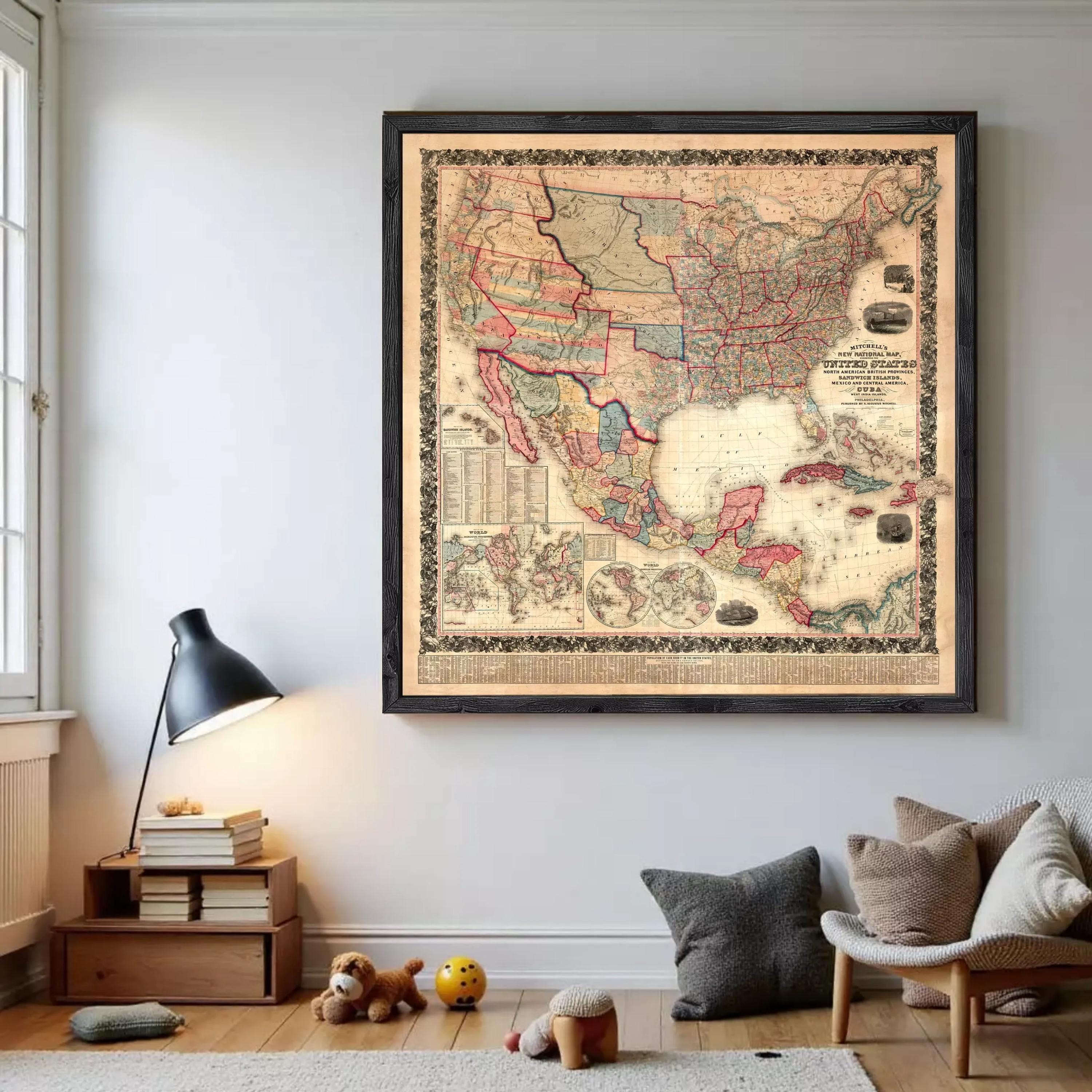 a large framed map of the United States hanging on a wall in a room.