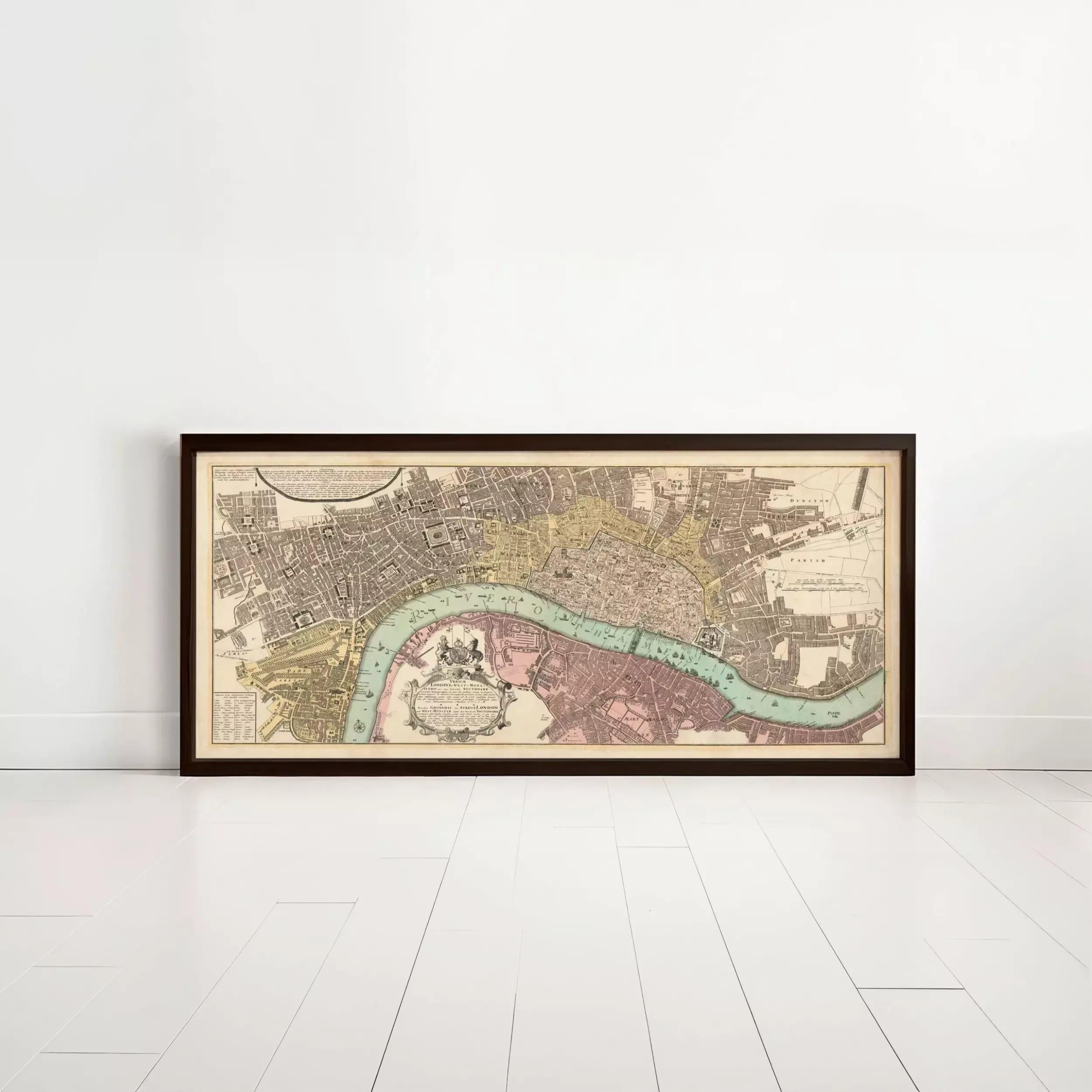 A framed historical map of London, featuring a detailed illustration of the city's streets, landmarks, and waterways.