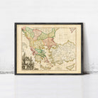 The image is a framed antique map of Europe, depicting the countries and regions of the continent in a vintage style.