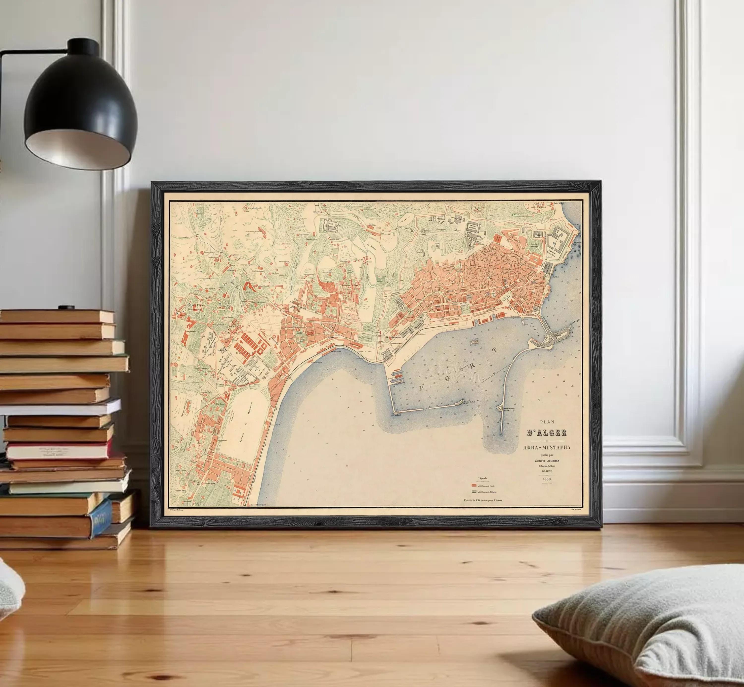 The image is a framed vintage map of a city, likely from the early 20th century, depicting the city's layout and surrounding areas.