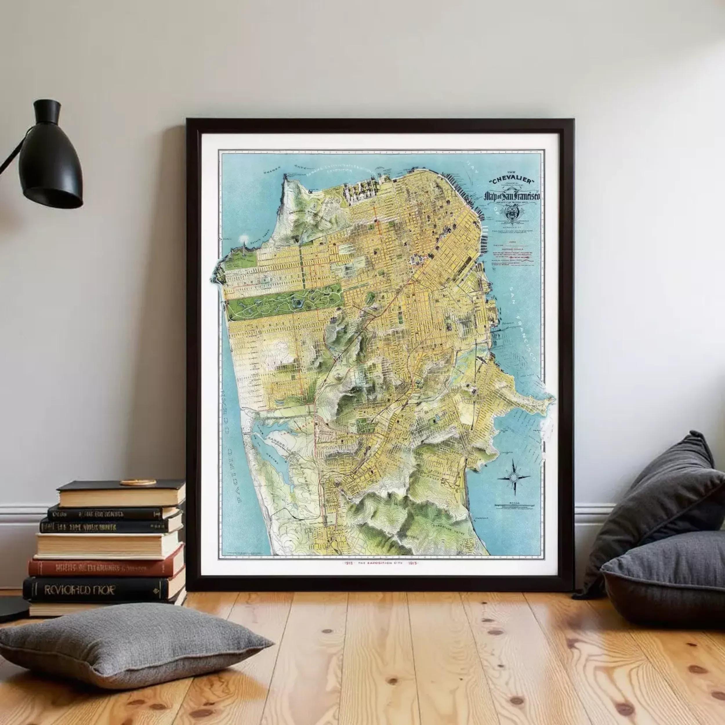 The image is a framed map of San Francisco, California, with a detailed and colorful depiction of the city's streets, landmarks, and surrounding areas.