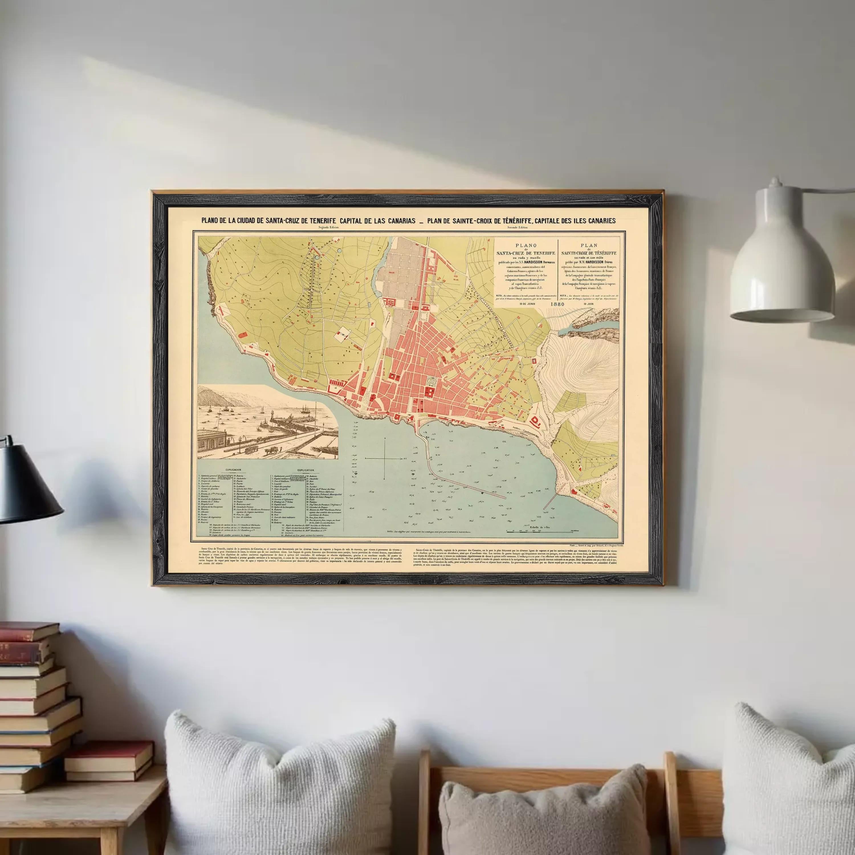 The image is a framed map of a coastal city, depicting the city's layout, surrounding areas, and possibly a harbor.