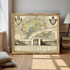 The image is a framed antique map of a city, depicting various landmarks and streets.