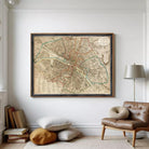 The image is a framed vintage map of Paris, France, depicting the city's streets and landmarks.