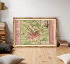 The image is a framed map of a city, likely a historical or geographical map, displayed on a wall.