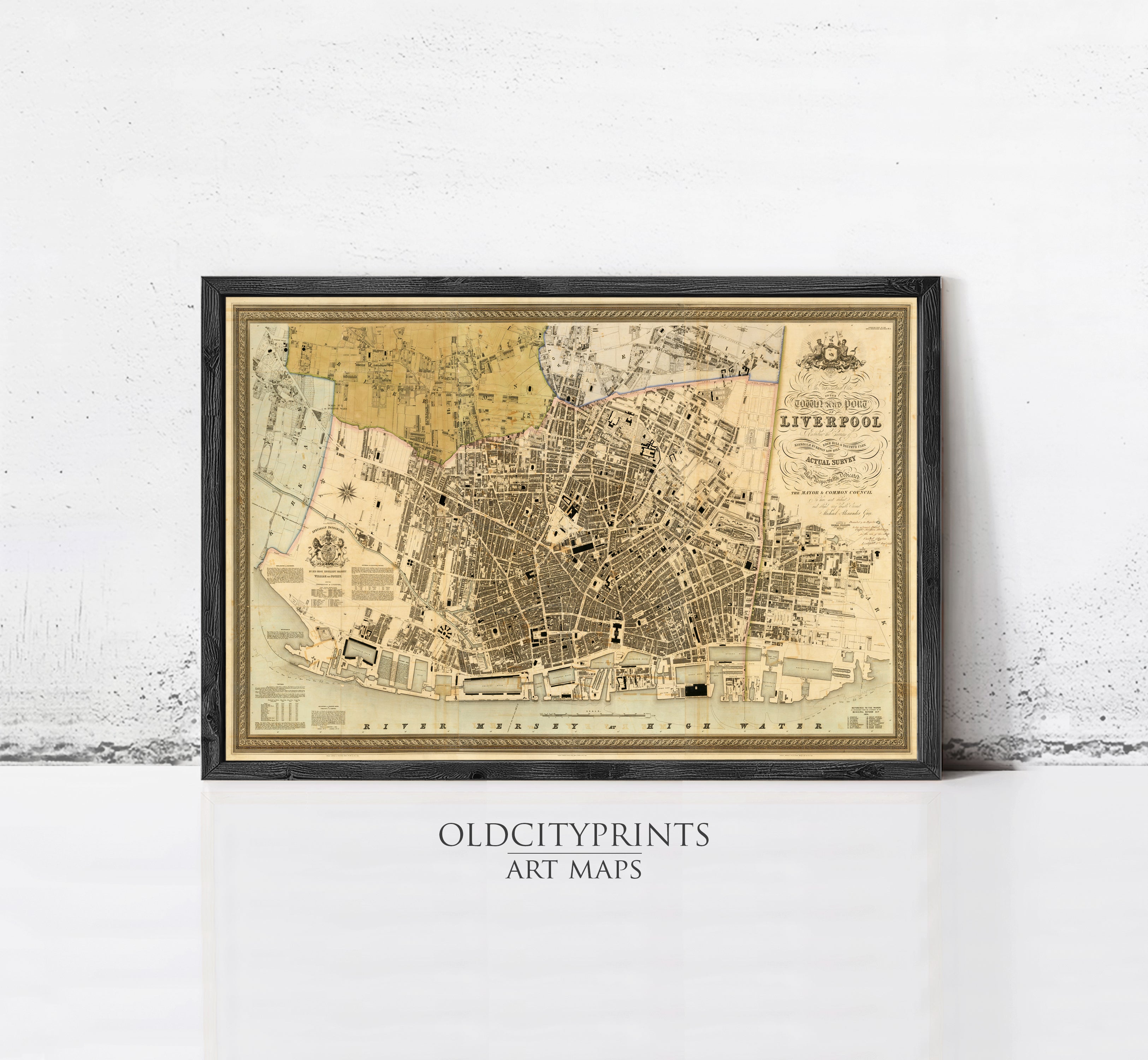 The image is a framed vintage map of Liverpool, England, depicting the city's layout and surrounding areas.