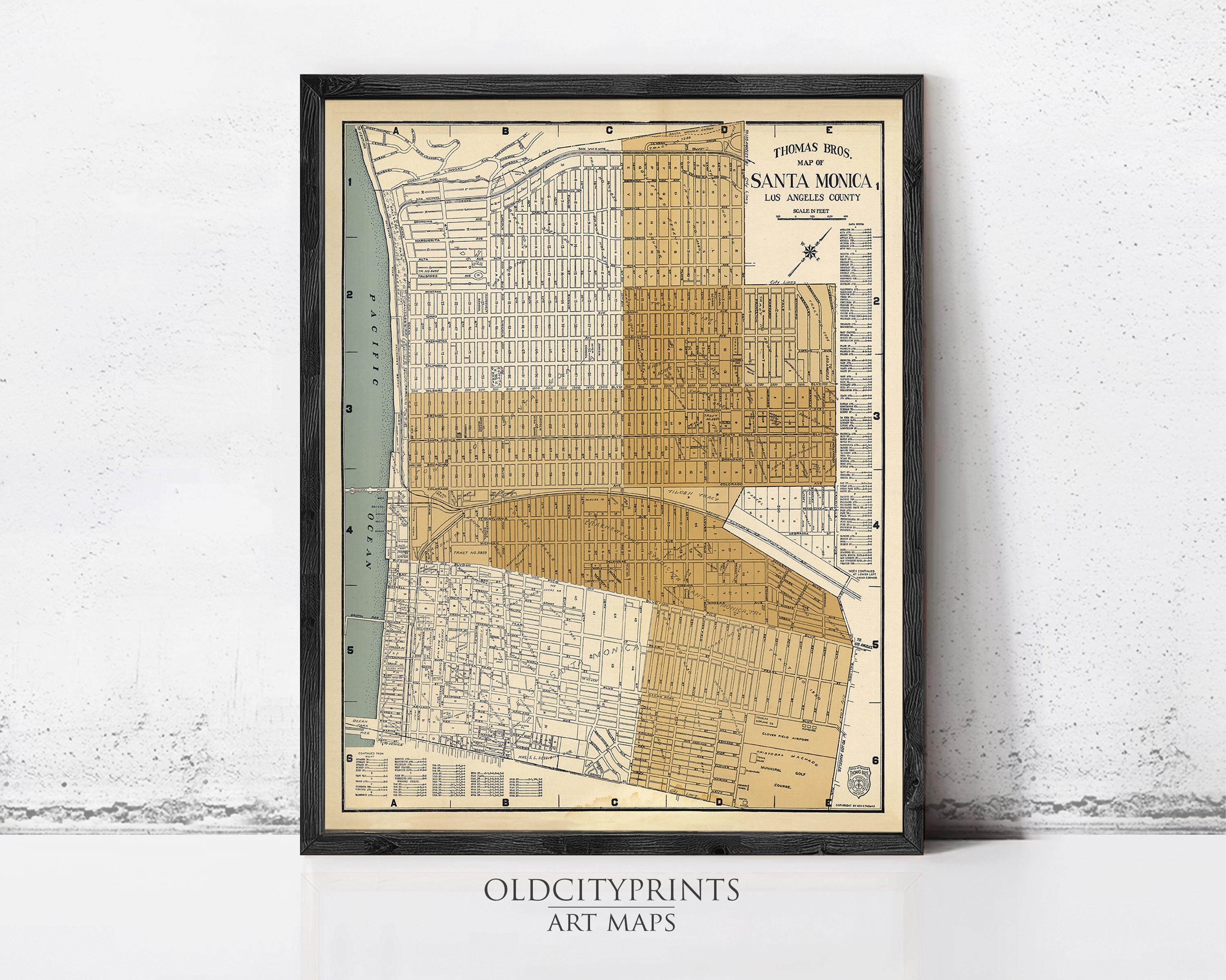 The image is a framed vintage map of Santa Monica, Los Angeles County, California, depicting the city's layout and surrounding areas.